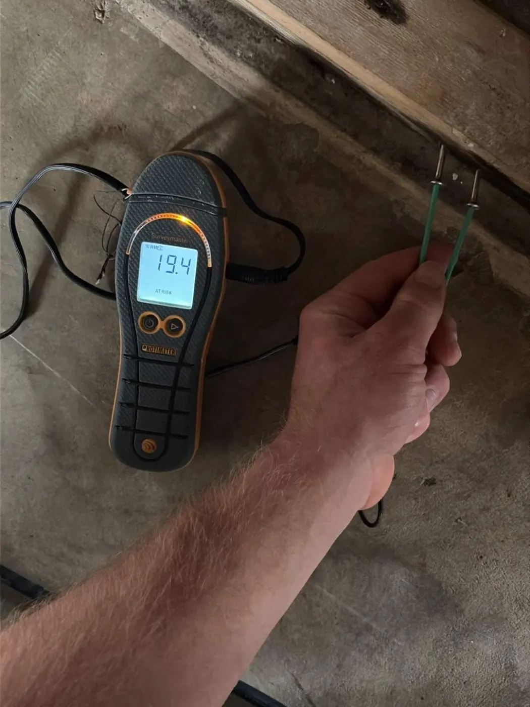 Moisture meter reading on drywall in Eagle Trace water loss